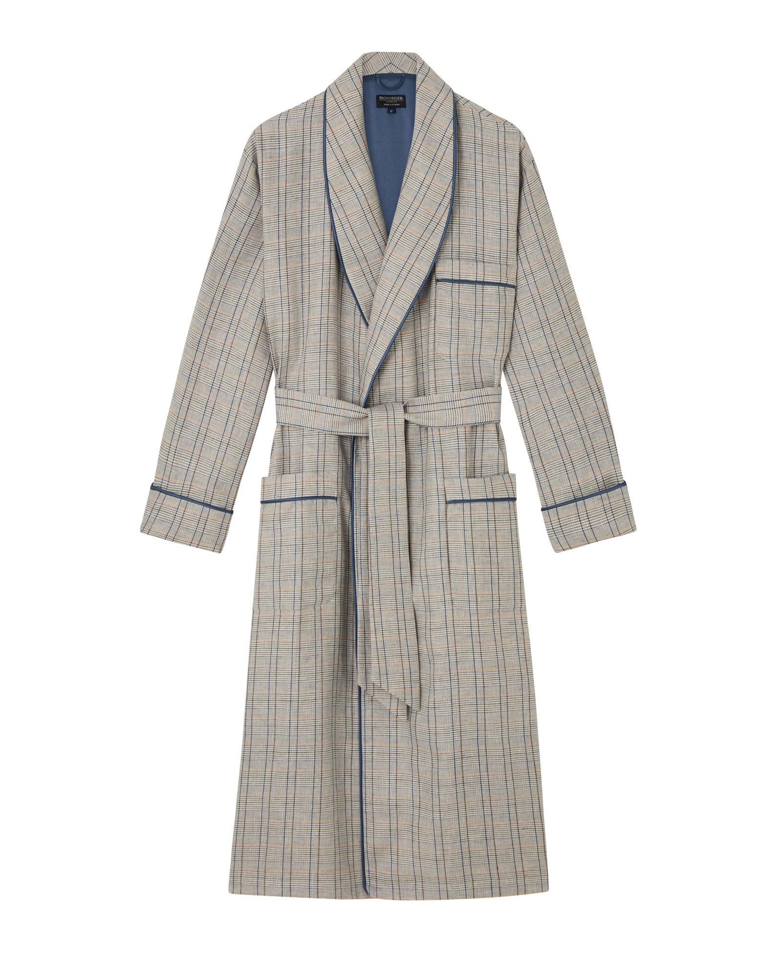 Bonsoir of London men's linen dressing gown in blue check design, silk lined, shawl collar, three pockets, turn-back cuffs, inside ties and a wide tie belt, flat shot on a studio background.