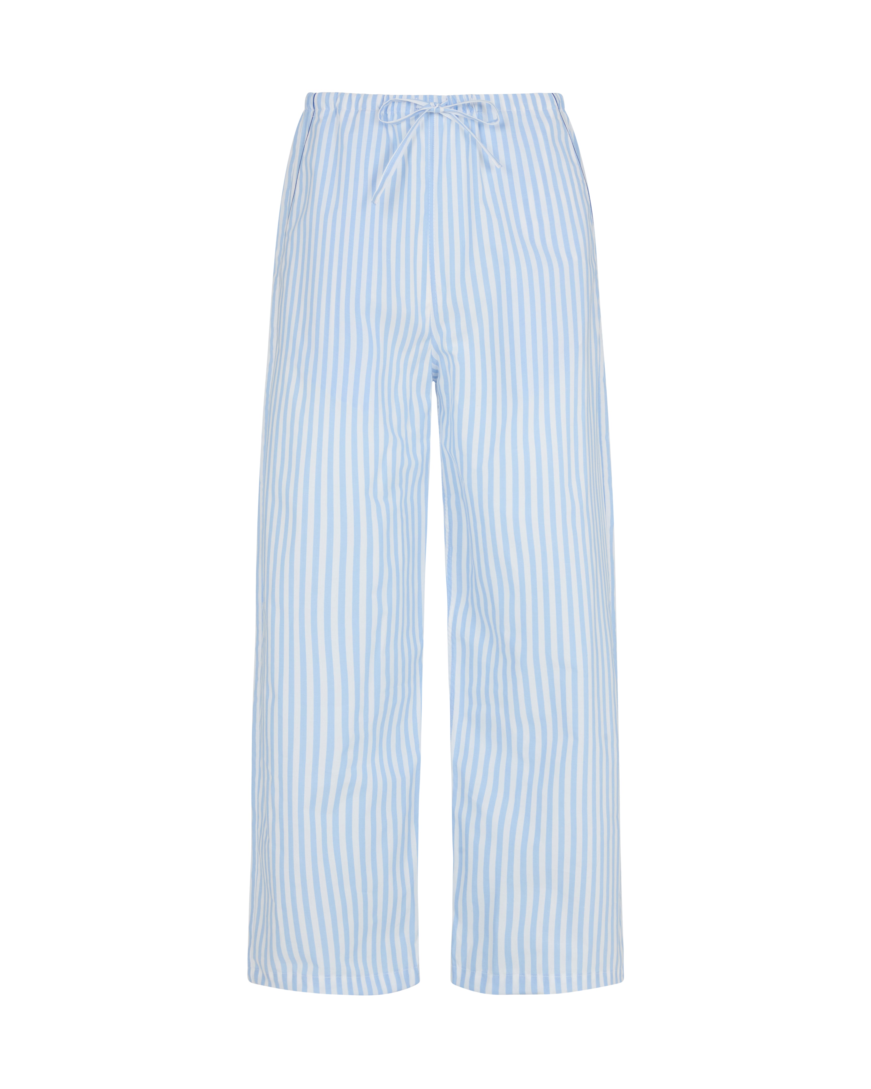 Bonsoir of London women's cotton pyjama trousers in blue stripe, fully elasticated tie waist, shot on a studio background.