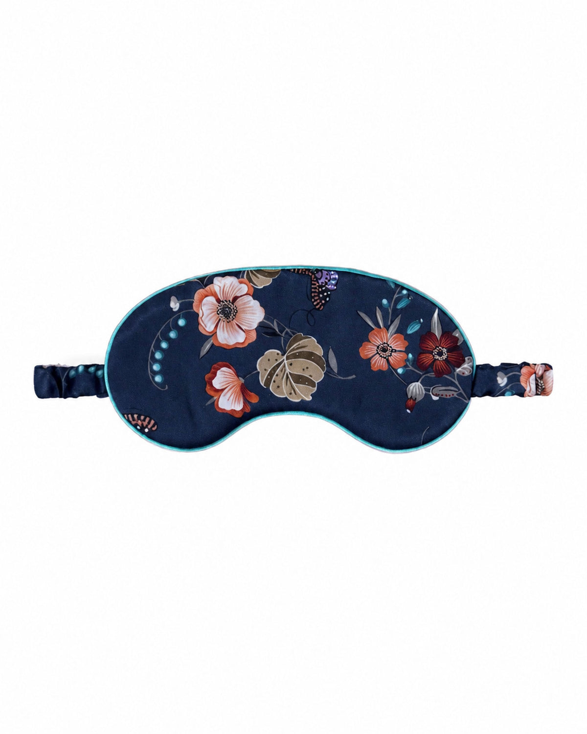 Bonsoir of London Women’s Audrey Floral Silk Eye Mask, featuring 19 momme 100% silk satin, black base with a multi-coloured floral design, cotton filling, flat lay product shot on white background.