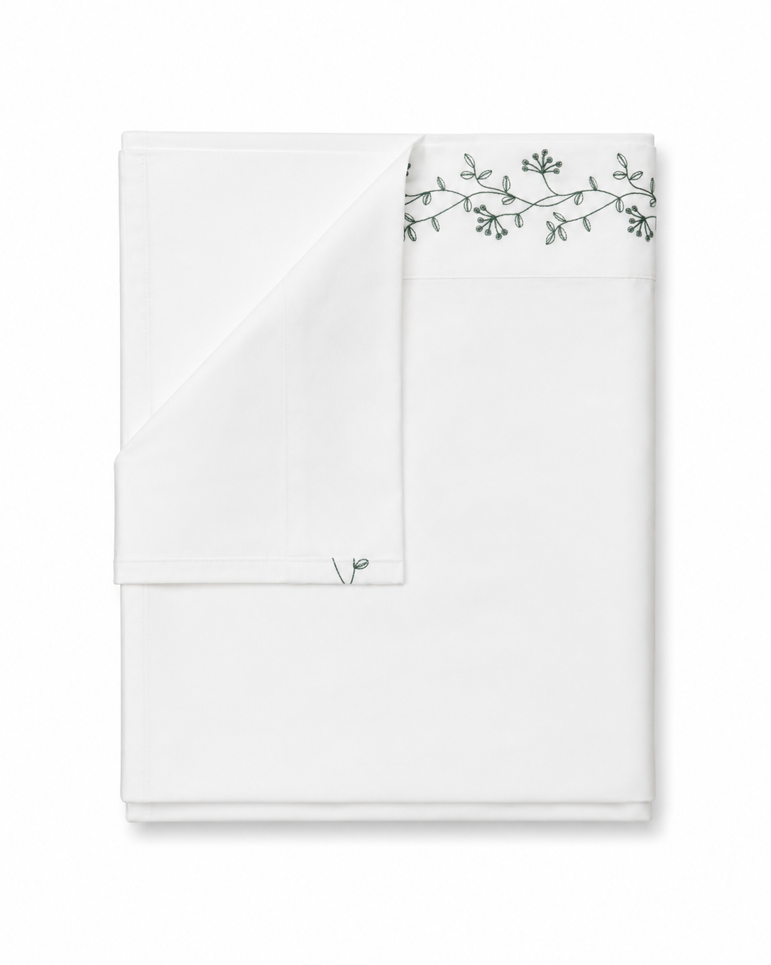Bonsoir of London white cotton flat sheet set with green floral embroidery on a white background.