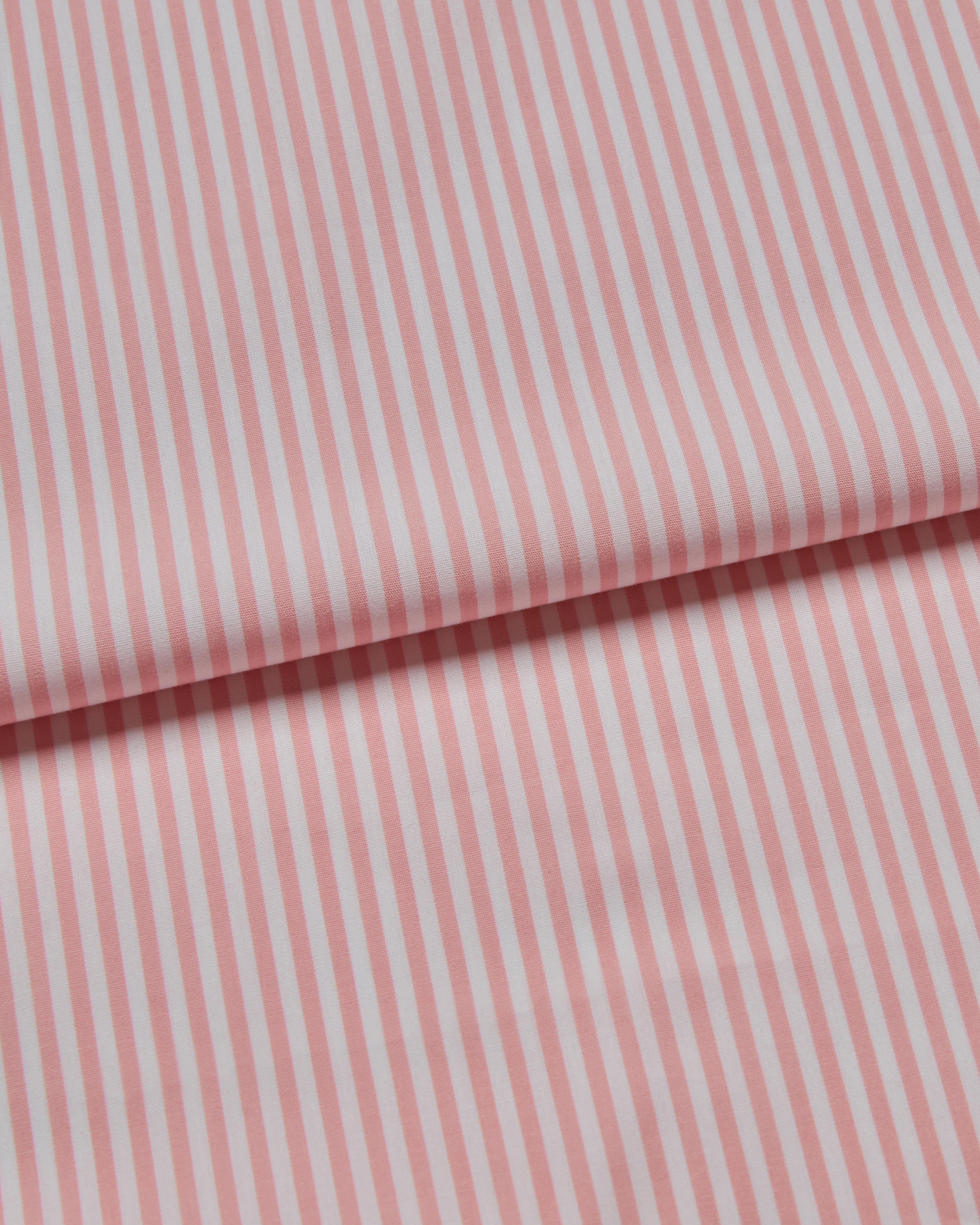 Close-up of pink fabric with white stripes