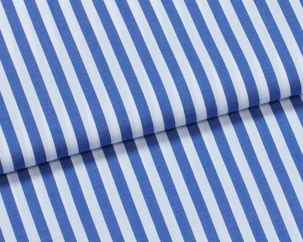Bonsoir of London blue and white stripe 100% cotton fabric, close-up detail shot.