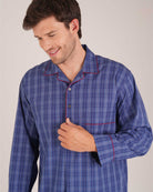 Bonsoir of London Men’s Edward Blue Plaid Classic Cotton Nightshirt, featuring a blue plaid check design, four-button placket, shirt-tail hem and generously cut fit, close up shot on a model.