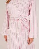 Bonsoir of London women’s brushed cotton dressing gown in Freya Pink Stripe, pink striped design, shot on model close up.