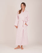 Bonsoir of London women’s brushed cotton dressing gown in Freya Pink Stripe, pink striped design, shot on model.