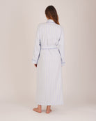 Bonsoir of London Women’s Isla Blue White Stripe Brushed Cotton Dressing Gown, featuring a blue and white striped design, shot on a model from the back.