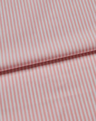 Close-up of pink fabric with white stripes