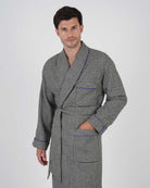 Man wearing a grey checkered dressing gown made of wool and silk
